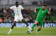 6 June 2025; Lamine Camara Mamadou of Senegal in action against Ryan Manning of Republic of Ireland during the international friendly match between Republic of Ireland and Senegal at the Aviva Stadium in Dublin. Photo by Stephen McCarthy/Sportsfile