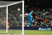 6 June 2025; Republic of Ireland goalkeeper Caoimhin Kelleher makes a save during the international friendly match between Republic of Ireland and Senegal at the Aviva Stadium in Dublin. Photo by Michael P Ryan/Sportsfile