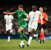 6 June 2025; Kasey McAteer of Republic of Ireland in action against Habib Diarra of Senegal during the international friendly match between Republic of Ireland and Senegal at the Aviva Stadium in Dublin. Photo by Michael P Ryan/Sportsfile