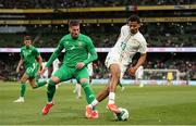 6 June 2025; Iliman Ndiaye of Senegal in action against Matt Doherty of Republic of Ireland during the international friendly match between Republic of Ireland and Senegal at the Aviva Stadium in Dublin. Photo by Michael P Ryan/Sportsfile