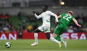 6 June 2025; Nathan Collins of Republic of Ireland in action against Krépin Diatta of Senegal during the international friendly match between Republic of Ireland and Senegal at the Aviva Stadium in Dublin. Photo by Stephen McCarthy/Sportsfile