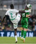 6 June 2025; Jason Knight of Republic of Ireland is tackled by Lamine Camara Mamadou of Senegal during the international friendly match between Republic of Ireland and Senegal at the Aviva Stadium in Dublin. Photo by Stephen McCarthy/Sportsfile