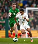 6 June 2025; Iliman Ndiaye of Senegal in action against Killian Phillips of Republic of Ireland during the international friendly match between Republic of Ireland and Senegal at the Aviva Stadium in Dublin. Photo by Ben McShane/Sportsfile