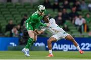 6 June 2025; Jake O'Brien of Republic of Ireland in action against Iliman Ndiaye of Senegal during the international friendly match between Republic of Ireland and Senegal at the Aviva Stadium in Dublin. Photo by Stephen McCarthy/Sportsfile