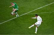 6 June 2025; Ismail Jakobs of Senegal has a shot on goal despite pressure from Killian Phillips of Republic of Ireland during the international friendly match between Republic of Ireland and Senegal at the Aviva Stadium in Dublin. Photo by Piaras Ó Mídheach/Sportsfile