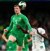 6 June 2025; Jake O'Brien of Republic of Ireland in action against Ismaïla Sarr of Senegal during the international friendly match between Republic of Ireland and Senegal at the Aviva Stadium in Dublin. Photo by Michael P Ryan/Sportsfile