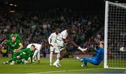 6 June 2025; Ismaïla Sarr of Senegal scores his side's first goal past Republic of Ireland goalkeeper Caoimhin Kelleher during the international friendly match between Republic of Ireland and Senegal at the Aviva Stadium in Dublin. Photo by Ben McShane/Sportsfile