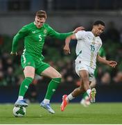 6 June 2025; Jake O'Brien of Republic of Ireland in action against Iliman Ndiaye of Senegal during the international friendly match between Republic of Ireland and Senegal at the Aviva Stadium in Dublin. Photo by Stephen McCarthy/Sportsfile