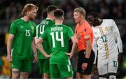 6 June 2025; Republic of Ireland players, from left, Liam Scales, Dara O'Shea and Andrew Moran remonstrate with referee Adam Ladebäck during the international friendly match between Republic of Ireland and Senegal at the Aviva Stadium in Dublin. Photo by Ben McShane/Sportsfile
