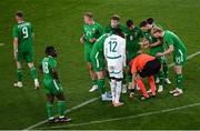 6 June 2025; Republic of Ireland players remonstrate with referee Adam Ladebäck after awarding a free kick to Senegal during the international friendly match between Republic of Ireland and Senegal at the Aviva Stadium in Dublin. Photo by Piaras Ó Mídheach/Sportsfile