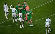 6 June 2025; Republic of Ireland players remonstrate with referee Adam Ladebäck after he awards a late free kick to Senegal during the international friendly match between Republic of Ireland and Senegal at the Aviva Stadium in Dublin. Photo by Piaras Ó Mídheach/Sportsfile
