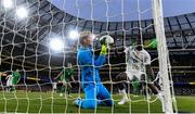 6 June 2025; Republic of Ireland goalkeeper Caoimhin Kelleher makes a goal-line save under pressure from Ismaïla Sarr of Senegal during the international friendly match between Republic of Ireland and Senegal at the Aviva Stadium in Dublin. Photo by Ben McShane/Sportsfile