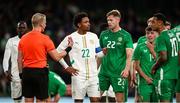 6 June 2025; Abdou Diallo of Senegal, centre, speaks with referee Adam Ladebäck during the international friendly match between Republic of Ireland and Senegal at the Aviva Stadium in Dublin. Photo by Michael P Ryan/Sportsfile