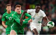 6 June 2025; Ismaïla Sarr of Senegal in action against Jake O'Brien of Republic of Ireland during the international friendly match between Republic of Ireland and Senegal at the Aviva Stadium in Dublin. Photo by Michael P Ryan/Sportsfile