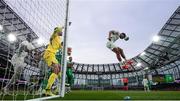 6 June 2025; Iliman Ndiaye of Senegal heads clear from a corner-kick during the international friendly match between Republic of Ireland and Senegal at the Aviva Stadium in Dublin. Photo by Stephen McCarthy/Sportsfile
