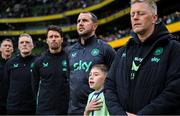 6 June 2025; Special guest Mason Geraghty stands with staff, from right, head coach Heimir Hallgrimsson, assistant head coach John O'Shea, assistant coach Paddy McCarthy, goalkeeping coach Gudmundur Hreidarsson and head of athletic performance Damien Doyle before the international friendly match between Republic of Ireland and Senegal at the Aviva Stadium in Dublin. Photo by Stephen McCarthy/Sportsfile