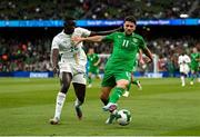 6 June 2025; Robbie Brady of Republic of Ireland in action against Antoine Mendy of Senegal during the international friendly match between Republic of Ireland and Senegal at the Aviva Stadium in Dublin. Photo by Stephen McCarthy/Sportsfile