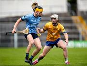 7 June 2025; Josh Bracken of Dublin in action against Dan Hogan  of Clare during the Electric Ireland Celtic Challenge Corn John Scott final match between Clare and Dublin at FBD Semple Stadium in Thurles, Tipperary. Photo by Michael P Ryan/Sportsfile