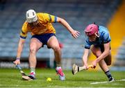 7 June 2025; Kyle Comerford of Dublin in action against Dan Hogan of Clare during the Electric Ireland Celtic Challenge Corn John Scott final match between Clare and Dublin at FBD Semple Stadium in Thurles, Tipperary. Photo by Michael P Ryan/Sportsfile