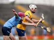7 June 2025; Dan Hogan of Clare in action against Kyle Comerford of Dublin during the Electric Ireland Celtic Challenge Corn John Scott final match between Clare and Dublin at FBD Semple Stadium in Thurles, Tipperary. Photo by Michael P Ryan/Sportsfile