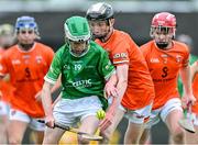 7 June 2025; Seán Tobin of Kildare in action against Shea McNaughton of Armagh during the Electric Ireland Celtic Challenge Corn Jerome O’Leary final match between Kildare and Armagh at the GAA National Games Development Centre in Abbotstown, Dublin. Photo by Stephen Marken/Sportsfile