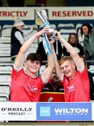 7 June 2025; Louth joint captains Luke McCourt, left, and Stephen Curtis lift the cup after the Electric Ireland Celtic Challenge Corn Tom Hogan final match between Cavan and Louth at Kingspan Breffni in Cavan. Photo by Thomas Flinkow/Sportsfile