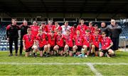 7 June 2025; The Louth team poses for photographs with the cup after the Electric Ireland Celtic Challenge Corn Tom Hogan final match between Cavan and Louth at Kingspan Breffni in Cavan. Photo by Thomas Flinkow/Sportsfile