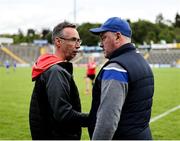 7 June 2025; Louth manager Ronan O'Gorman, left, and Cavan manager Patrick Delaney shake hands after the Electric Ireland Celtic Challenge Corn Tom Hogan final match between Cavan and Louth at Kingspan Breffni in Cavan. Photo by Thomas Flinkow/Sportsfile