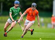 7 June 2025; Conor Hughes of Armagh in action against Colin Parker of Kildare during the Electric Ireland Celtic Challenge Corn Jerome O’Leary final match between Kildare and Armagh at the GAA National Games Development Centre in Abbotstown, Dublin. Photo by Stephen Marken/Sportsfile