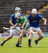 7 June 2025; Conal McGrath of Fermanagh in action against Longford players, from left, Adam Dunsworth  and Sam Elliott during the Electric Ireland Celtic Challenge Corn Michael Feery final match between Longford and Fermanagh at Kingspan Breffni in Cavan. Photo by Thomas Flinkow/Sportsfile