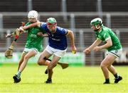 7 June 2025; Thomas Finn of Longford in action against Fermanagh players, from left, Eoghan McManus and Ronan McCann during the Electric Ireland Celtic Challenge Corn Michael Feery final match between Longford and Fermanagh at Kingspan Breffni in Cavan. Photo by Thomas Flinkow/Sportsfile