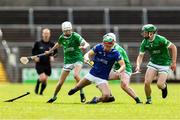 7 June 2025; Thomas Finn of Longford in action against Fermanagh players, from left, Eoghan McManus, Ronan McCann, and Michael Cleary during the Electric Ireland Celtic Challenge Corn Michael Feery final match between Longford and Fermanagh at Kingspan Breffni in Cavan. Photo by Thomas Flinkow/Sportsfile