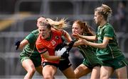 7 June 2025; Kelly Mallon of Armagh is tackled by Meath players, from left, Sarah Wall, Karla Kealy and Mary Kate Lynch during the TG4 All-Ireland Ladies Football Senior Championship Round 1 match between Meath and Armagh at Páirc Tailteann in Navan, Meath. Photo by Ben McShane/Sportsfile