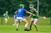 7 June 2025; Cathal Flynn of Meath in action against Ben Meade of Laois during the Electric Ireland Celtic Challenge Corn William Robinson final match between Meath and Laois at the GAA National Games Development Centre in Abbotstown, Dublin. Photo by Stephen Marken/Sportsfile