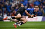 7 June 2025; Jamie Osborne of Leinster dives over to score a try, which was subsequently disallowed, during the United Rugby Championship semi-final match between Leinster and Glasgow Warriors at the Aviva Stadium in Dublin. Photo by Seb Daly/Sportsfile
