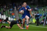 7 June 2025; Jamie Osborne of Leinster evades the tackle of Josh McKay of Glasgow Warriors on his way to scoring his side's second try during the United Rugby Championship semi-final match between Leinster and Glasgow Warriors at the Aviva Stadium in Dublin. Photo by Brendan Moran/Sportsfile