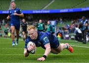 7 June 2025; Jamie Osborne of Leinster dives over to score his side's second try during the United Rugby Championship semi-final match between Leinster and Glasgow Warriors at the Aviva Stadium in Dublin. Photo by Brendan Moran/Sportsfile