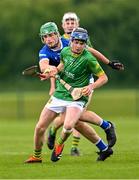 7 June 2025; Cathal Flynn of Meath in action against Ben Meade of Laois during the Electric Ireland Celtic Challenge Corn William Robinson final match between Meath and Laois at the GAA National Games Development Centre in Abbotstown, Dublin. Photo by Stephen Marken/Sportsfile