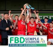7 June 2025; Cork White joint captains, Josh Brosnan left, and Dave Barry lift the cup after the Electric Ireland Celtic Challenge Corn Michael Hogan final match between Tipperary Gold and Cork White at FBD Semple Stadium in Thurles, Tipperary. Photo by Michael P Ryan/Sportsfile