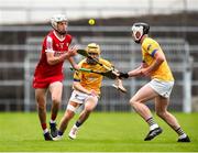 7 June 2025; Josh Brosnan of Cork White in action against Daniel McKelvey of Tipperary Gold during the Electric Ireland Celtic Challenge Corn Michael Hogan final match between Tipperary Gold and Cork White at FBD Semple Stadium in Thurles, Tipperary. Photo by Michael P Ryan/Sportsfile