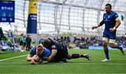 7 June 2025; Ciarán Frawley of Leinster scores his side's sixth try despite the attention of Sam Talakai of Glasgow Warriors during the United Rugby Championship semi-final match between Leinster and Glasgow Warriors at the Aviva Stadium in Dublin. Photo by Brendan Moran/Sportsfile