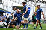 7 June 2025; Ciarán Frawley of Leinster with teammates Jack Conan and Scott Penny after scoring their side's sixth try during the United Rugby Championship semi-final match between Leinster and Glasgow Warriors at the Aviva Stadium in Dublin. Photo by Brendan Moran/Sportsfile