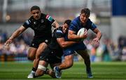 7 June 2025; Scott Penny of Leinster is tackled by Macenzzie Duncan of Glasgow Warriors during the United Rugby Championship semi-final match between Leinster and Glasgow Warriors at the Aviva Stadium in Dublin. Photo by Brendan Moran/Sportsfile