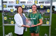7 June 2025; Aoibhín Cleary of Meath receives the Player of the Match award from Trina Murray, LGFA President, after the TG4 All-Ireland Ladies Football Senior Championship Round 1 match between Meath and Armagh at Páirc Tailteann in Navan, Meath. Photo by Ben McShane/Sportsfile