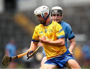 7 June 2025; Rian O’Donnell of Clare in action against Ben Flanagan of Dublin during the Electric Ireland Celtic Challenge Corn John Scott final match between Clare and Dublin at FBD Semple Stadium in Thurles, Tipperary. Photo by Michael P Ryan/Sportsfile