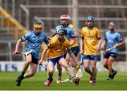 7 June 2025; Rory Chaplin of Clare in action against Josh Bracken of Dublin during the Electric Ireland Celtic Challenge Corn John Scott final match between Clare and Dublin at FBD Semple Stadium in Thurles, Tipperary. Photo by Michael P Ryan/Sportsfile