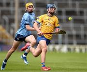 7 June 2025; Luke Madden of Clare in action against Jack Mills of Dublin during the Electric Ireland Celtic Challenge Corn John Scott final match between Clare and Dublin at FBD Semple Stadium in Thurles, Tipperary. Photo by Michael P Ryan/Sportsfile
