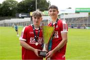 7 June 2025; Cork White joint captains Dave Barry, left, and Josh Brosnan with the cup after the Electric Ireland Celtic Challenge Corn Michael Hogan final match between Tipperary Gold and Cork White at FBD Semple Stadium in Thurles, Tipperary. Photo by Michael P Ryan/Sportsfile