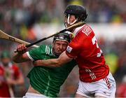 7 June 2025; Aidan O'Connor of Limerick is tackled by Eoin Downey of Cork during the Munster GAA Hurling Senior Championship final match between Limerick and Cork at LIT Gaelic Grounds in Limerick. Photo by Ray McManus/Sportsfile