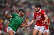 7 June 2025; Aidan O'Connor of Limerick is tackled by Eoin Downey of Cork during the Munster GAA Hurling Senior Championship final match between Limerick and Cork at LIT Gaelic Grounds in Limerick. Photo by Ray McManus/Sportsfile